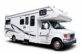 A white rv parked in the street with no people around. A white rv parked in the street with no people around.